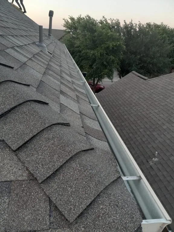 Slide of Truly Roofing & Construction