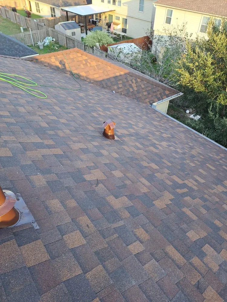 Slide of Truly Roofing & Construction