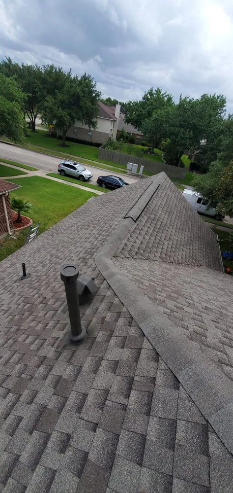 Slide of Truly Roofing & Construction