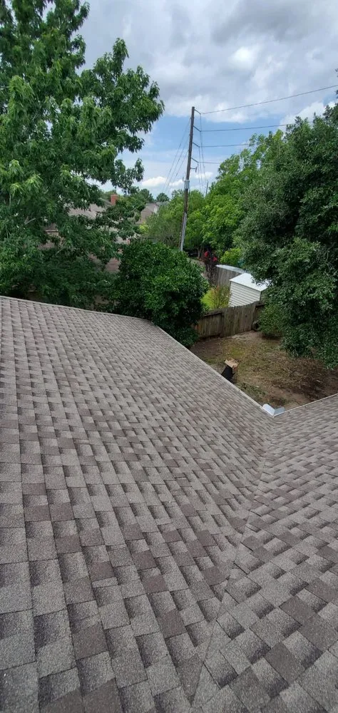 Slide of Truly Roofing & Construction