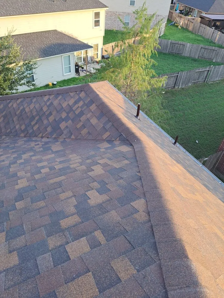 Slide of Truly Roofing & Construction