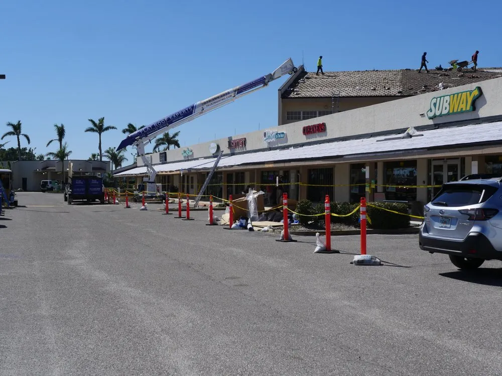 Slide of Trust Roofing