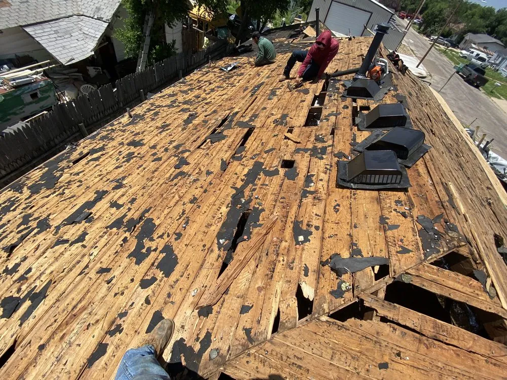 Slide of TRX Roofing & Construction