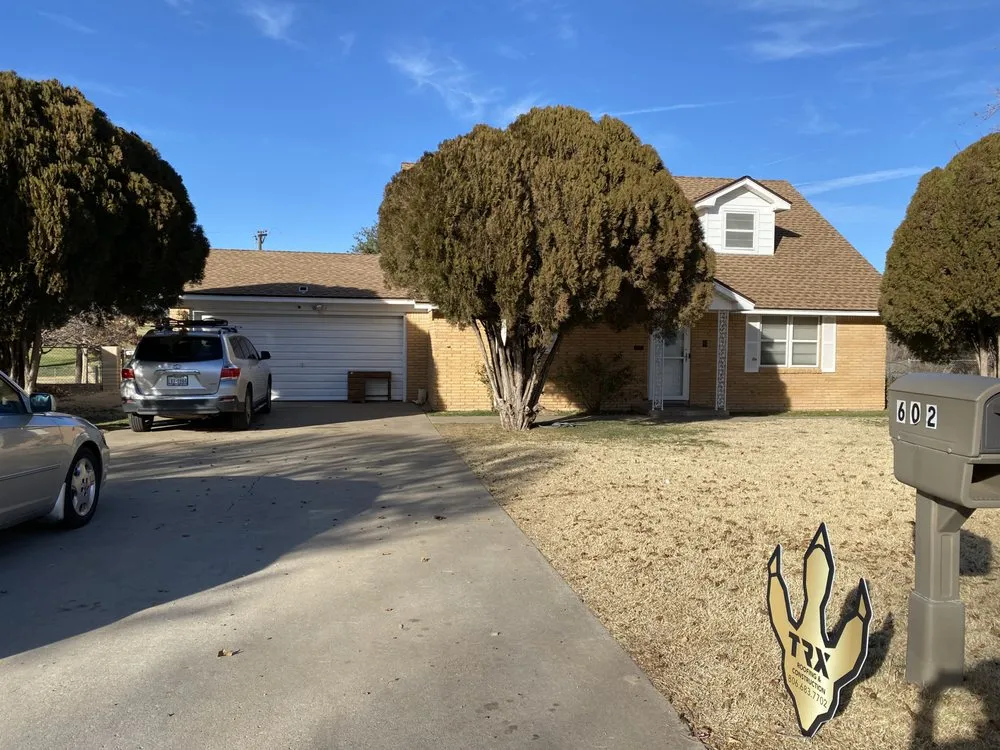 Slide of TRX Roofing & Construction