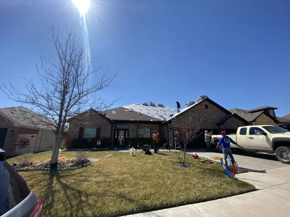 Slide of TRX Roofing & Construction