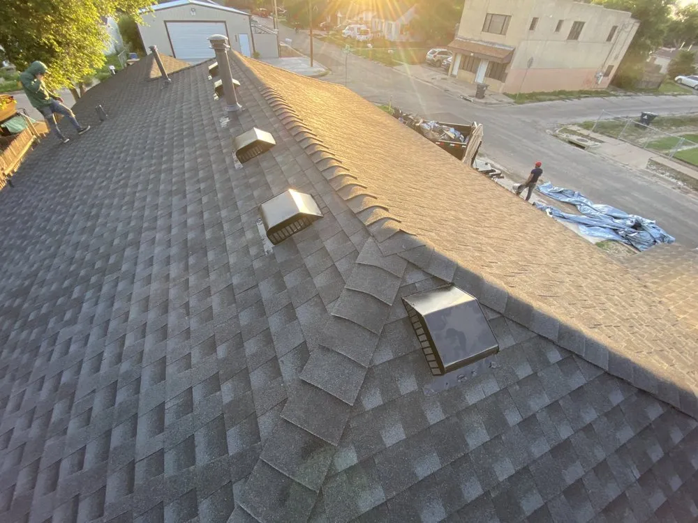 Slide of TRX Roofing & Construction