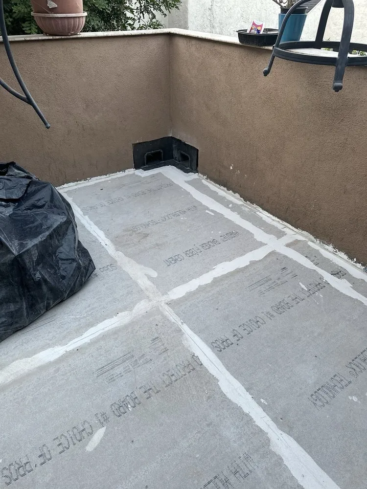 Slide of T’s Roofing 