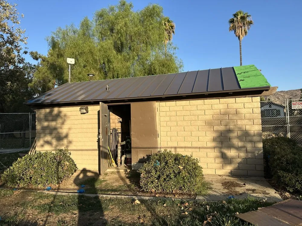 Slide of T’s Roofing 