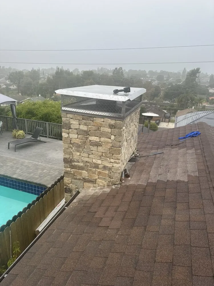 Slide of T’s Roofing 