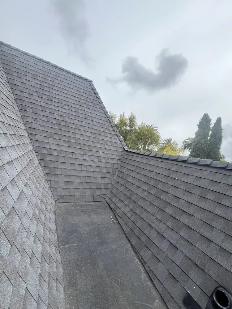 Slide of T’s Roofing 