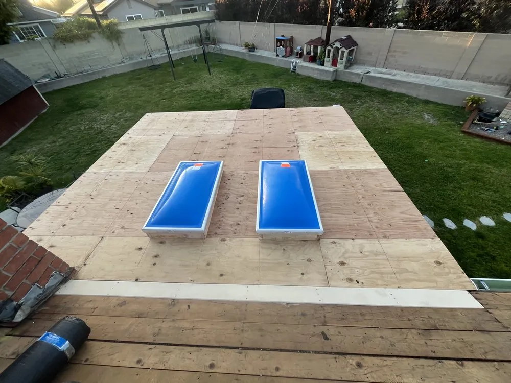 Slide of T’s Roofing 