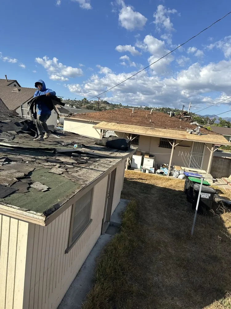 Slide of T’S Roofing