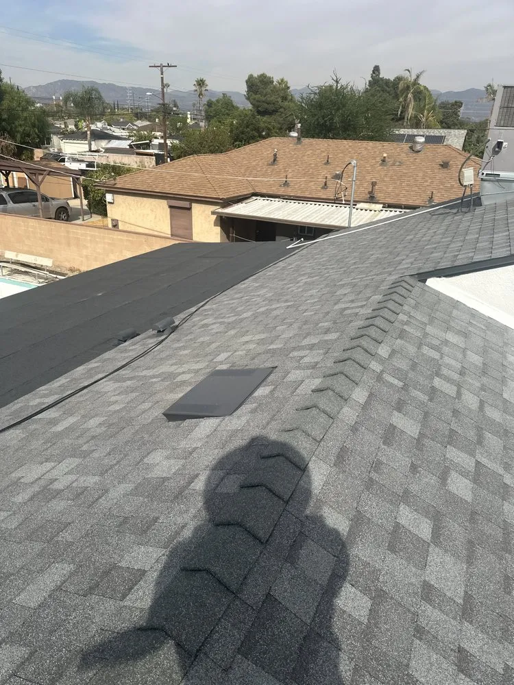 Slide of T’S Roofing