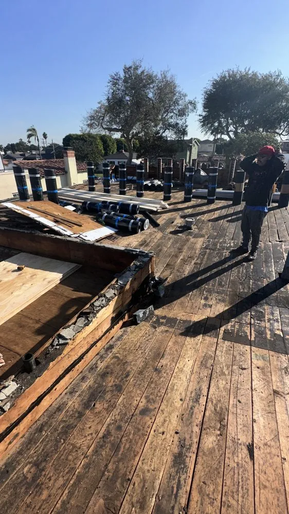 Slide of T’S Roofing