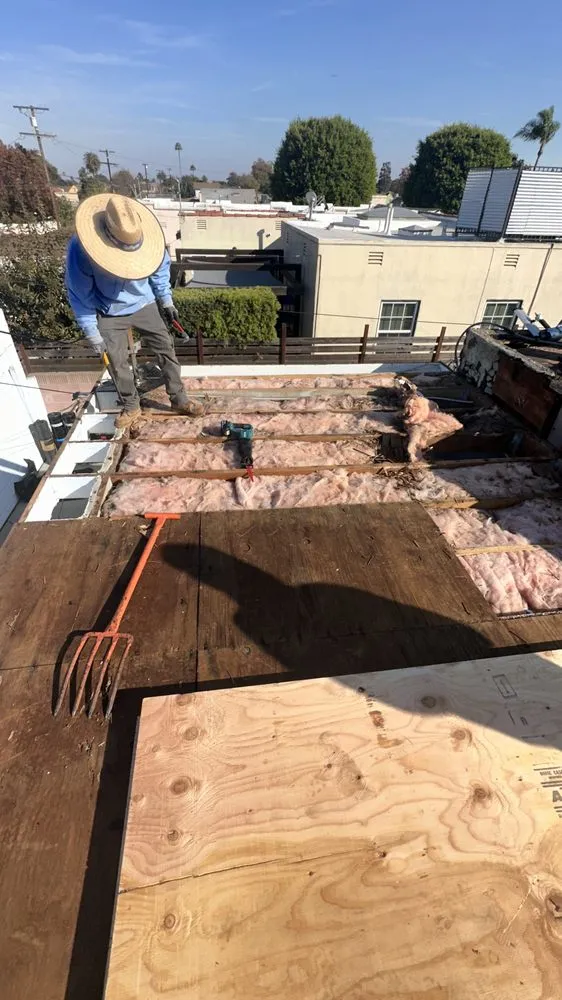 Slide of T’S Roofing