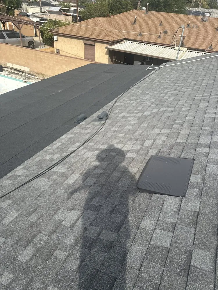 Slide of T’S Roofing