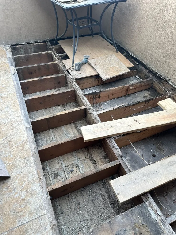 Slide of T’S Roofing