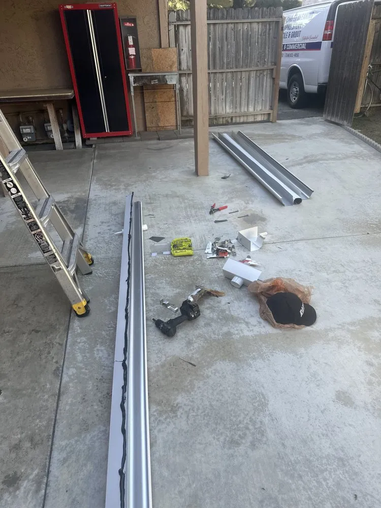 Slide of T’S Roofing