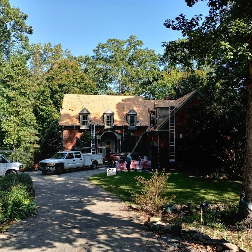 Slide of TS Solutions Roofing & Gutters