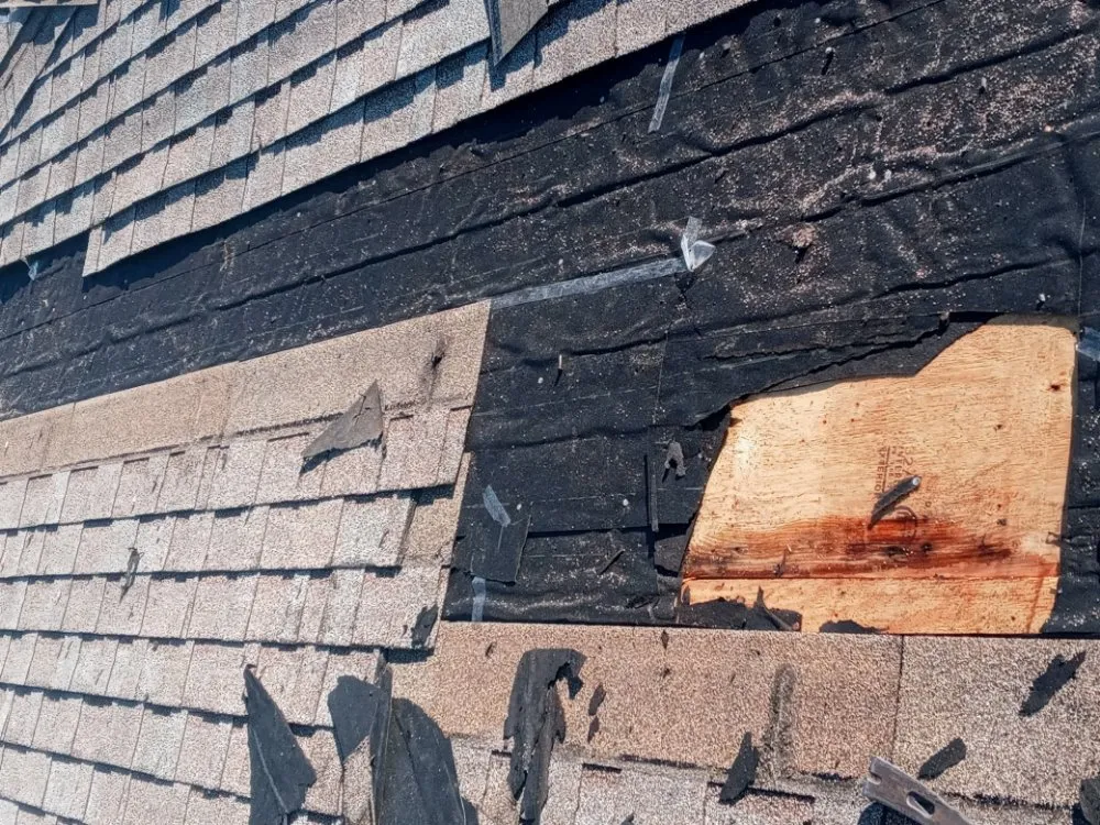 Slide of TS Solutions Roofing & Gutters