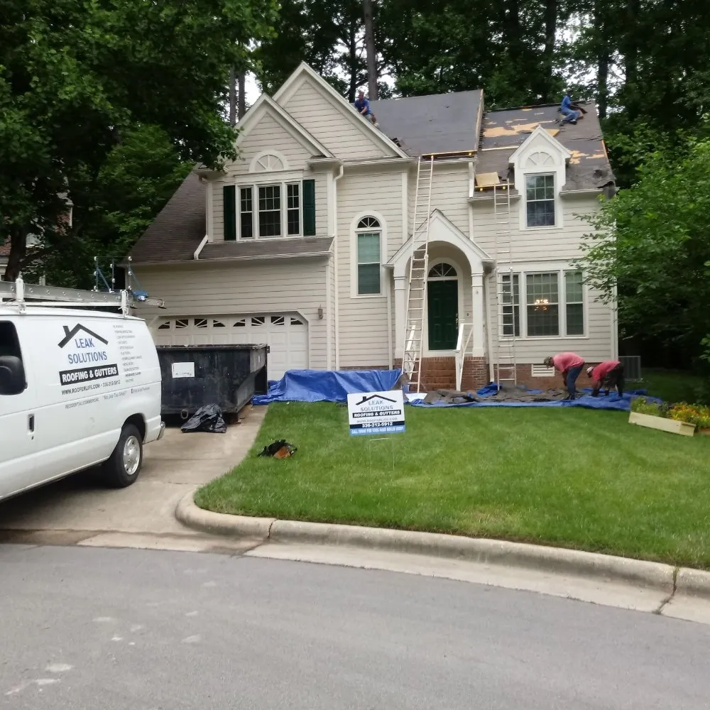 Slide of TS Solutions Roofing & Gutters