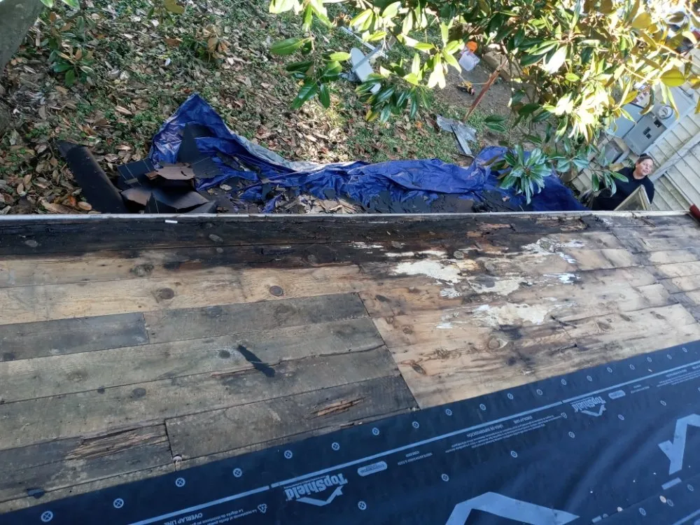 Slide of TS Solutions Roofing & Gutters