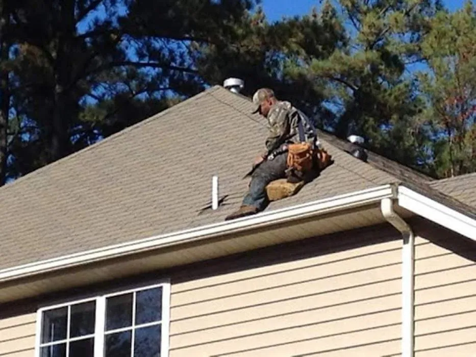 Slide of TS Solutions Roofing & Gutters