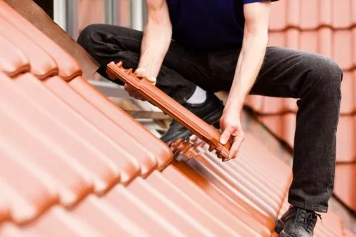 Top-rated flat roof repair after storm damage in St Cloud, FL by TSK Exteriors