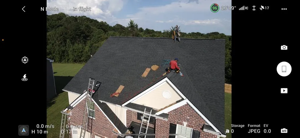 Slide of T&T Roofing