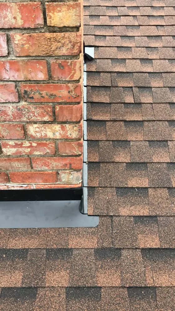 Slide of T&T Roofing