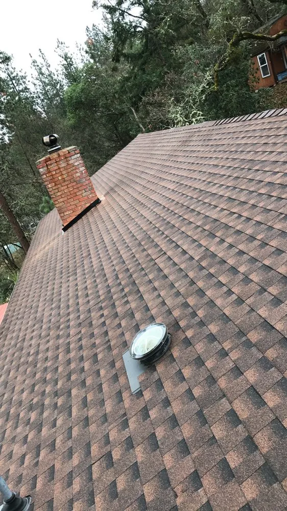 Slide of T&T Roofing