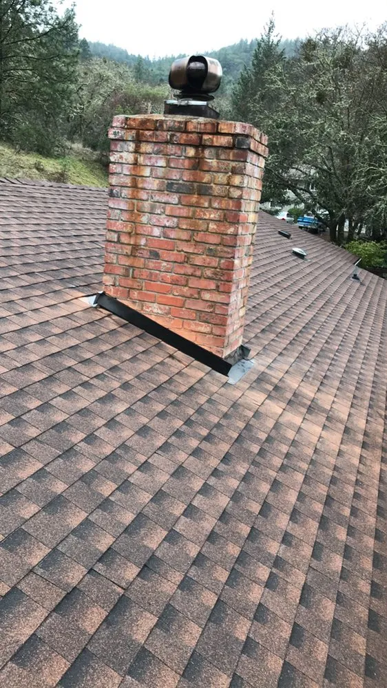 Slide of T&T Roofing