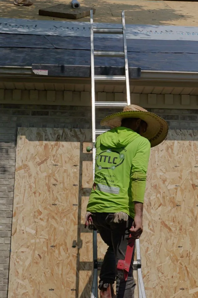 Slide of TTLC Roofing Siding & Gutters