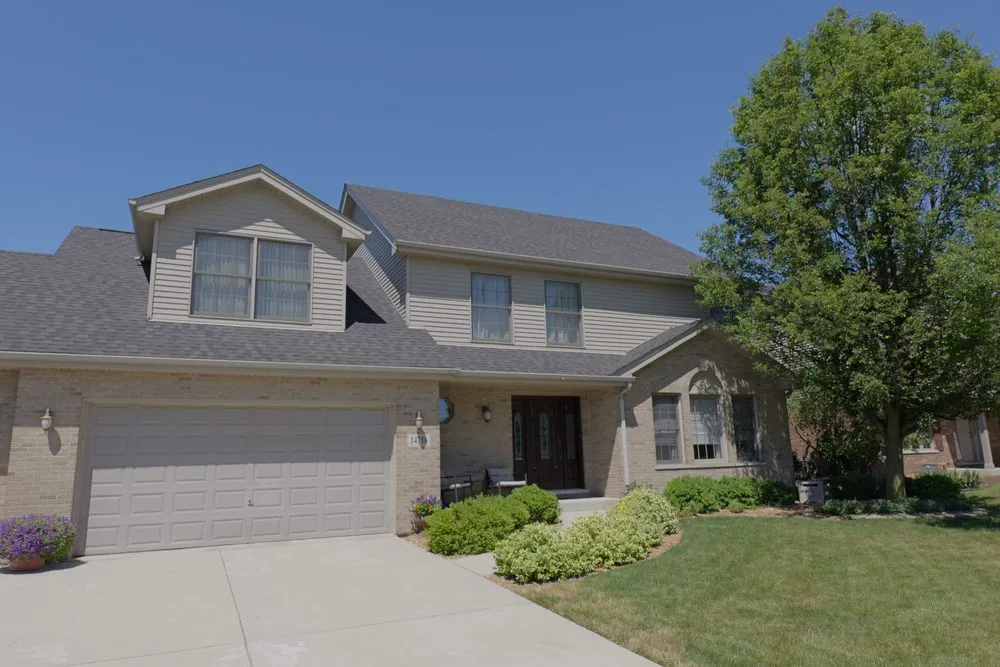 Slide of TTLC Roofing Siding & Gutters