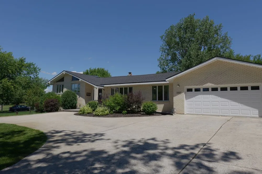 Slide of TTLC Roofing Siding & Gutters