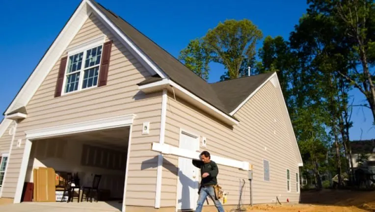 Slide of TTLC Roofing Siding & Gutters