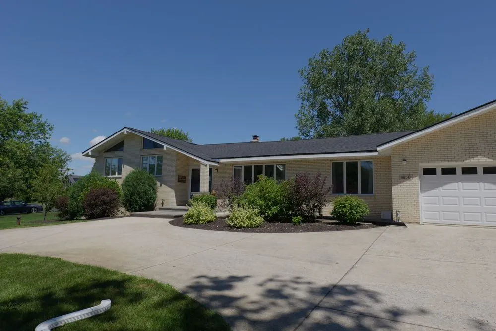 Slide of TTLC Roofing Siding & Gutters