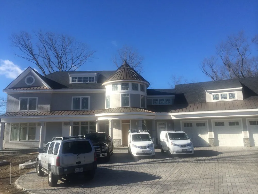 Slide of Tucci Roofing & Siding