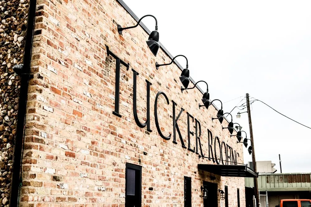 Slide of Tucker Roofing Systems