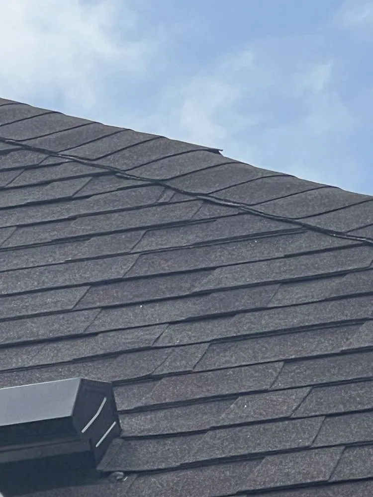 Slide of Tucker Roofing Systems