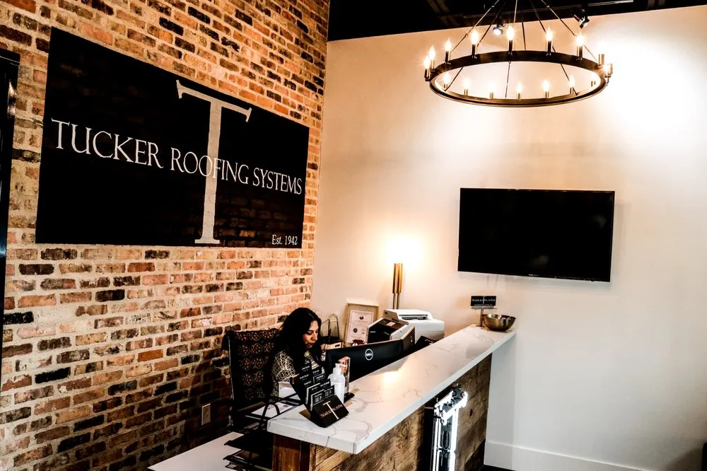 Slide of Tucker Roofing Systems