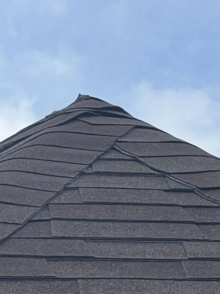 Slide of Tucker Roofing Systems