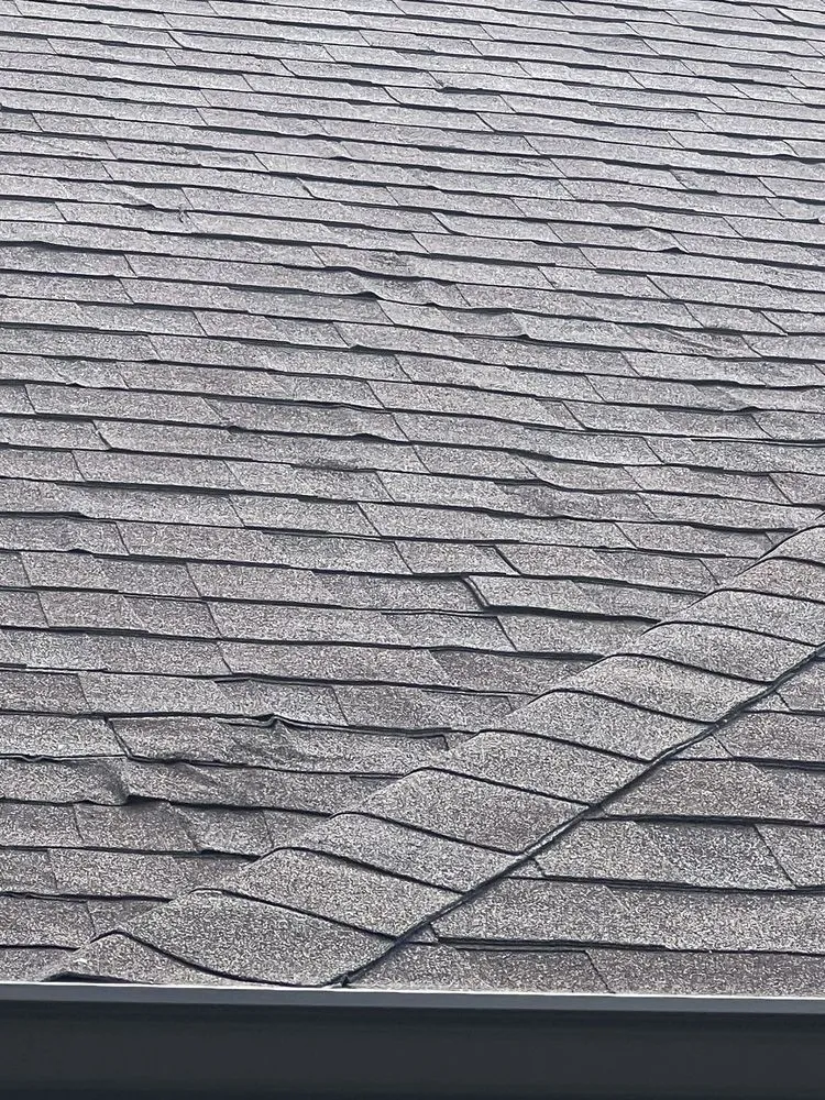 Slide of Tucker Roofing Systems