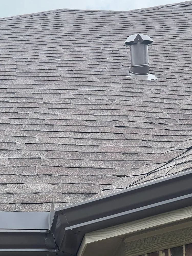 Slide of Tucker Roofing Systems