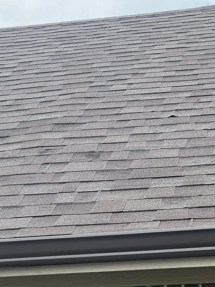 Slide of Tucker Roofing Systems