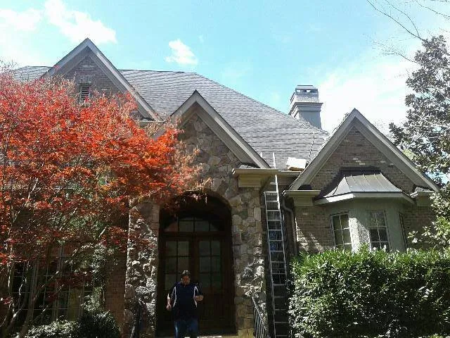 Slide of Tuckers Roofing & Construction