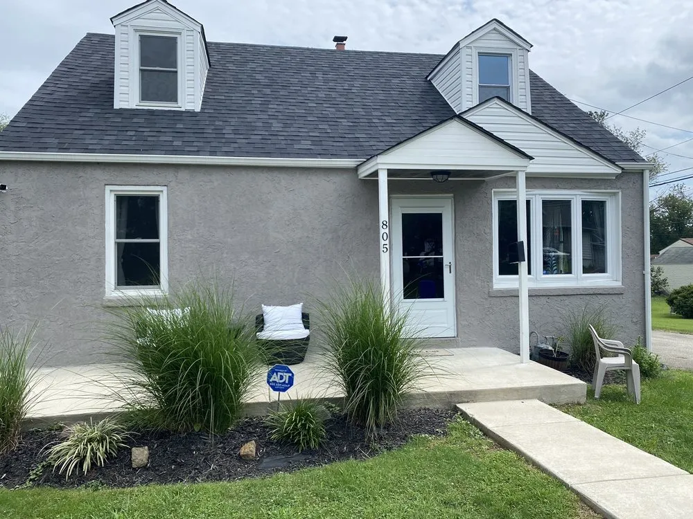 Slide of Tufano & Sons Roofing
