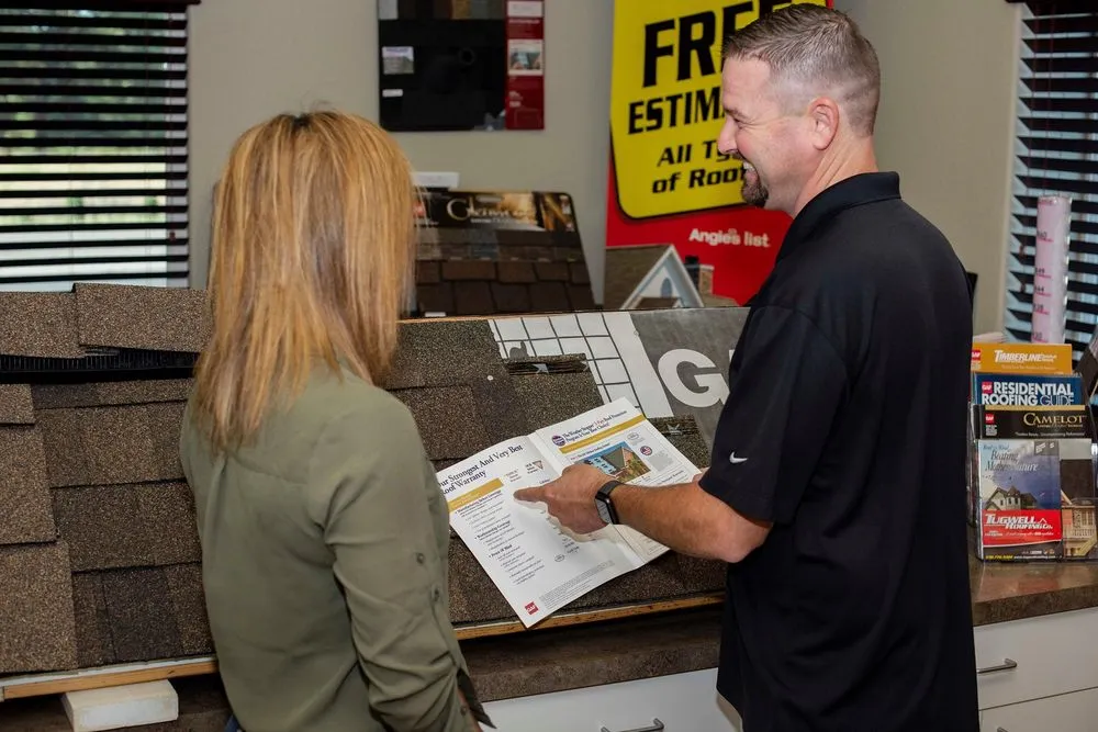 Slide of Tugwell Roofing