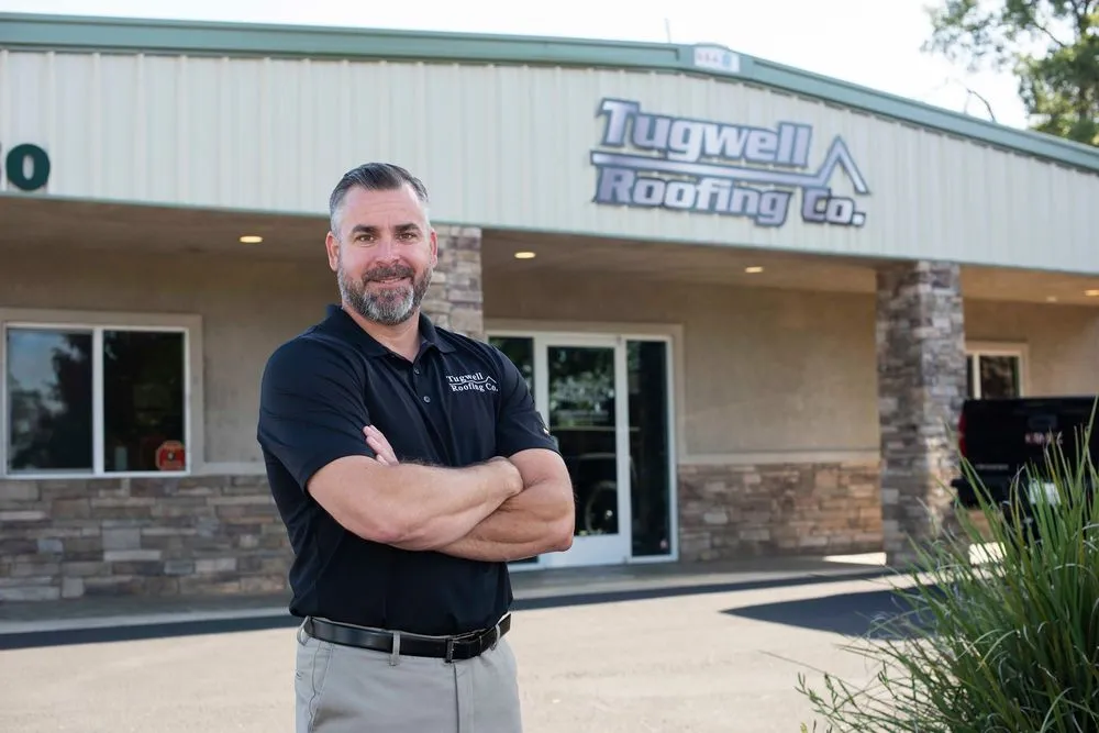 Slide of Tugwell Roofing