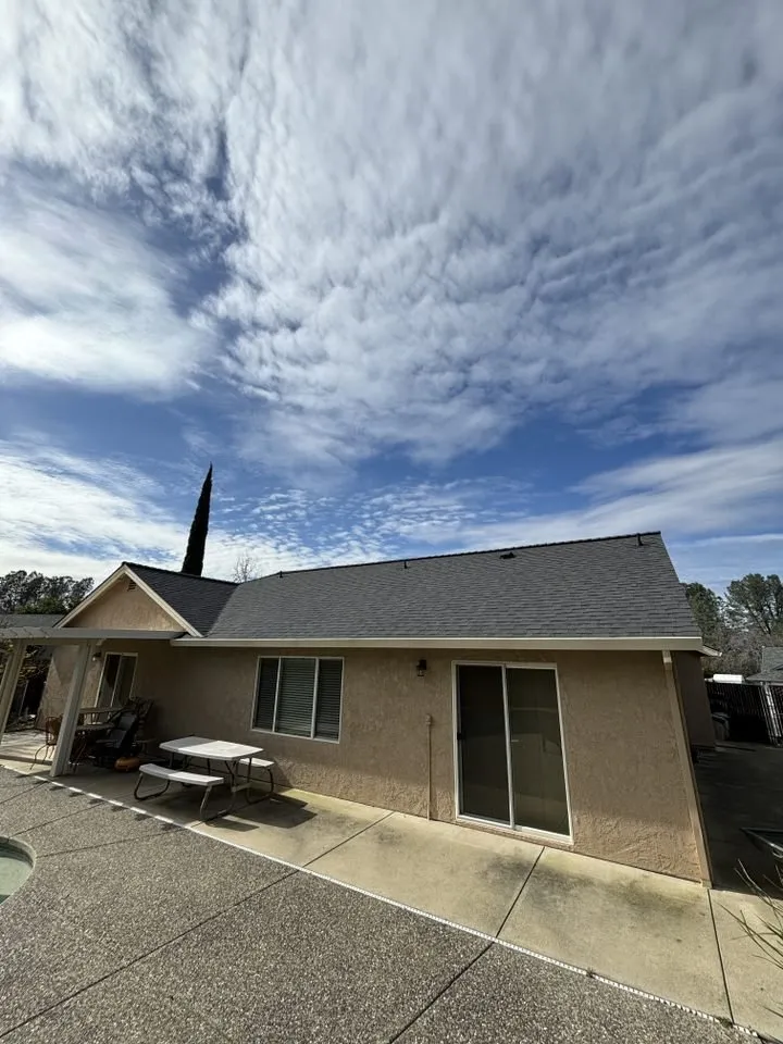 Slide of Tugwell Roofing